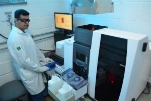 Technician performing water analysis test. Source: INB. Technician performing water analysis test. Source: INB.